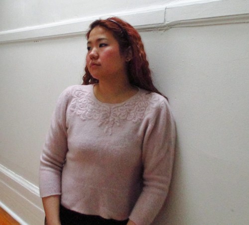 This sweater has a vintage vibe, because it is vintage.  I actually used scissors to crop the sweater!  No hemming necessary because the wool doesn't fray.  Sweet DIY.