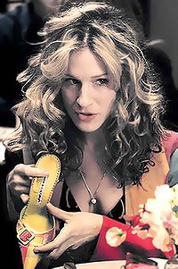 Carrie Bradshaw is considered a fashion icon in terms of heeled designer glam.  But she paid steeply for it in many ways...