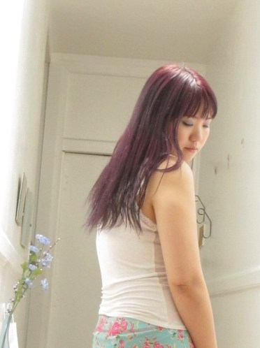 Here I am showing off the length of my hair.  It grew about two inches in six months.  That is with trims occasionally so it's actually good!