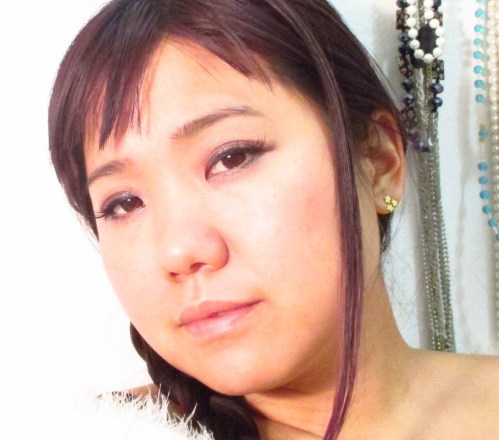 This is me in my half length falsies.  Believe it or not, because of my eye size, half lashes add enough drama...