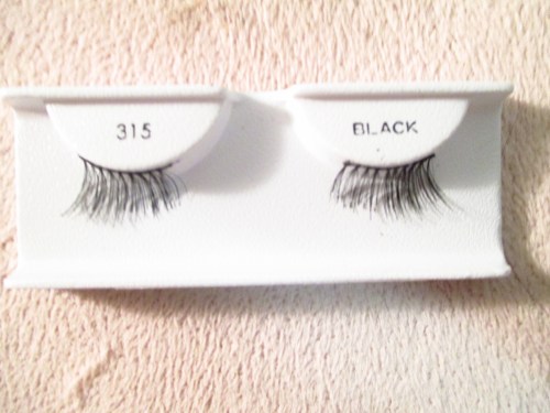 My half length "accent" lashes that I applied, just to the outer half of my eyelash lid.  They do the trick and look rather natural...