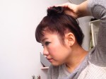 coil the hair in a bun shape around the base of the pony tail.  Tuck in ends underneath the bun. arms tired yet? Mine were.