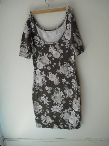 This was originally the back of this fitted jersey dress.  Just by carefully removing the stitches on the label in the back, I can now wear this with the flattering scoop neck in the front.  