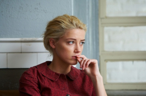 Amber Heard's character does a lot of worrying in this movie, but look and the simple pastel palette that is used on her eyes and mouth.