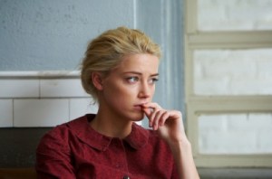 Amber Heard's character does a lot of worrying in this movie, but look and the simple pastel palette that is used on her eyes and mouth.
