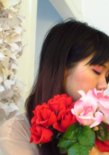 I was feeling shy and mysterious in this photo. And a bit moody. Fits in with the spirit of roses...I think.