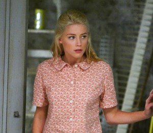 It doesn't look like a lot of make-up, but it is. To get this look, you need disheveled hair, dark lined brows, and a neutral lip. I think it is a youthful make-up.