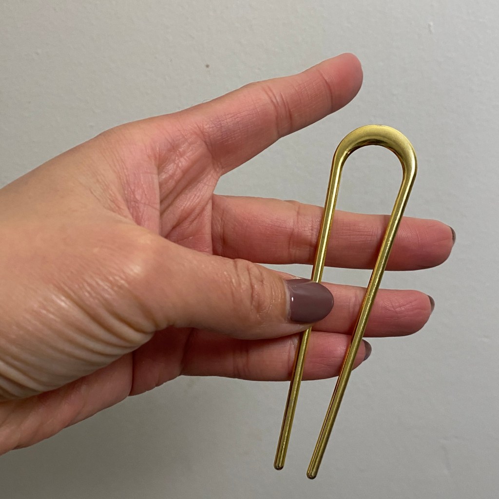 A simple french pin is the way to fasten a bun and make it look chique